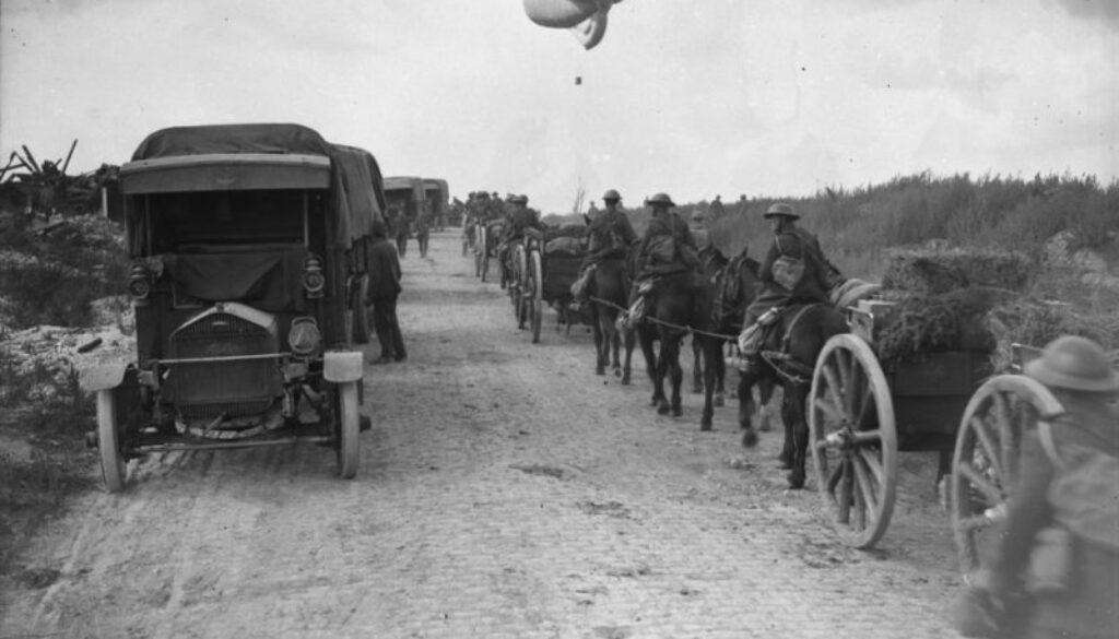 150_Canadian Artillery passing an Observation Balloon which is being brought down. Advance East of Arras. September, 1918.
